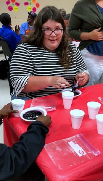 summer youth student learning a relaxation skill--making slime